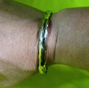Silvertone braided Bangle bracelet